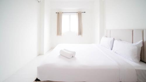 Surabaya Appartement | Best Choice 2BR at Puncak Dharmahusada Apartment Surabaya By Travelio