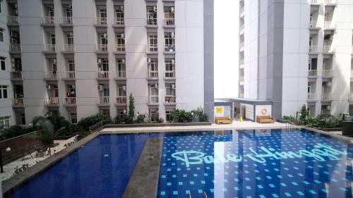 Surabaya Appartement | Best Choice and Cozy Living 2BR at Bale Hinggil Apartment By Travelio