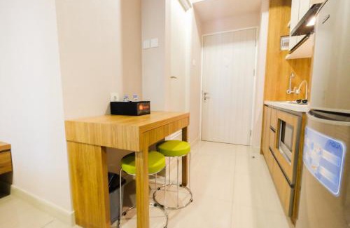 Bekasi Barat Appartement | Best Furnished Studio Grand Kamala Lagoon Apartment By Travelio