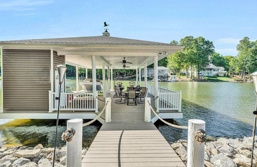 Westlake Corner Maison | BEST location on Smith Mtn lake! Waterfront home w POOL & Dock in no wake zone.