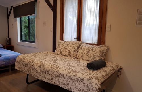 The Pocket Cabine | BIRDSONG: A quaint Swiss Style Cabin, nestled in nature in Byron Bay Hinterland!