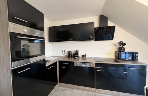Loerrach Appartement | BlackNCozy - Design apartment with box-spring bed and balcony