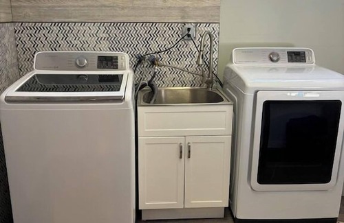Miller Beach Appartement | Blocks from the beach with giant covered deck, firepit, and grill!