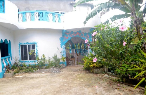Fairy Hill Maison | Blue Balcony Room at Robin Hood guest house