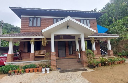 Mannarkkad Maison | Blue Hills View, a peaceful retreat nestled in the Attapadi mountains.