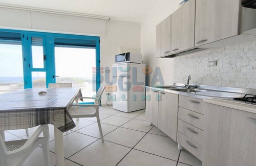 Posto Rosso Maison | Blue House seafront studio apartment in Red Place