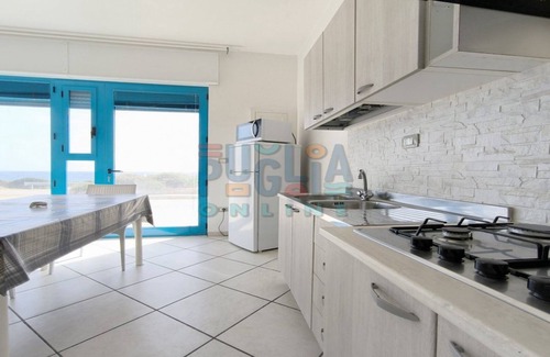 Posto Rosso Maison | Blue House seafront studio apartment in Red Place