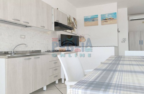 Posto Rosso Maison | Blue House seafront studio apartment in Red Place