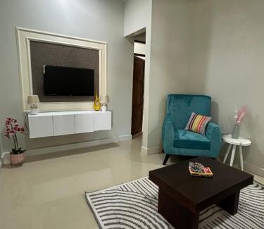 Msasani Maison | Blue wave loft master bedroom