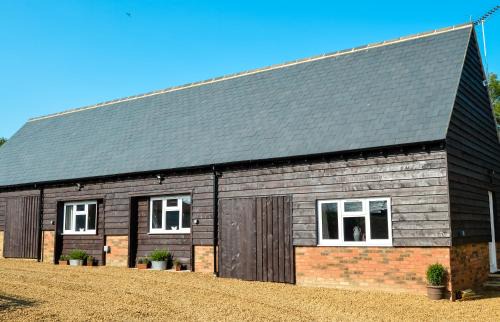 Brackley Appartement | Bluebell Cottage at The Old Tractor Barn