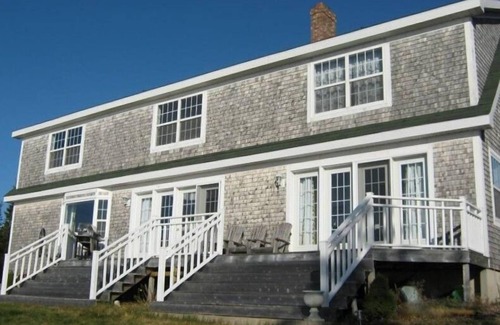 Beaver Harbour Maison | Maison audacieuse de style cap en bord de mer sur la baie de Fundy