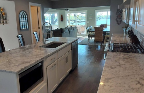Round Lake Maison | Brand new from the studs to the pillows! The Lakeshore House..