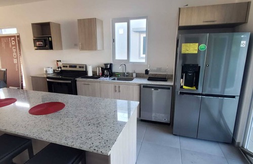 Paquera Maison | Brand new private home in a gated colony. 5 min walk to beach and all facilities
