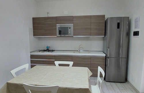 Peschici Maison | Appartement neuf de trois pièces avec véranda, piscine et climat