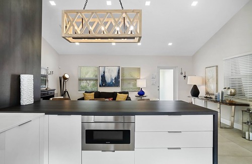 South Middle River Maison | Breathtaking Pool Home and Backyard by Wilton Mnrs