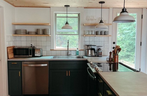 Nelscott Cottage | Bright 2 bedroom with ocean and forest views - pet friendly!