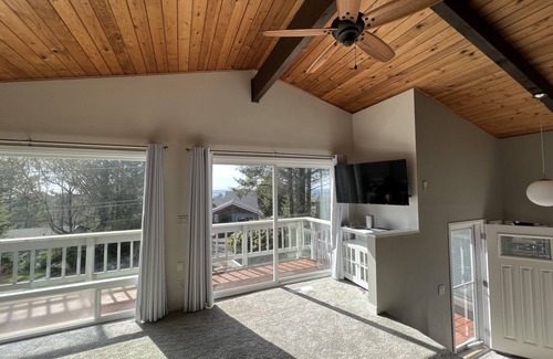 Nelscott Cottage | Bright 2 bedroom with ocean and forest views - pet friendly!