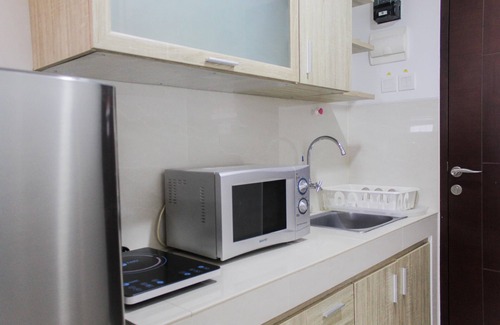 Panunggangan Utara Appartement | Bright Studio Apartment at Springwood Residence