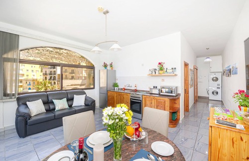 Munxar Appartement | Brilliant Beachfront Apartment with Super Sunset views in Xlendi Bay, Gozo Malta
