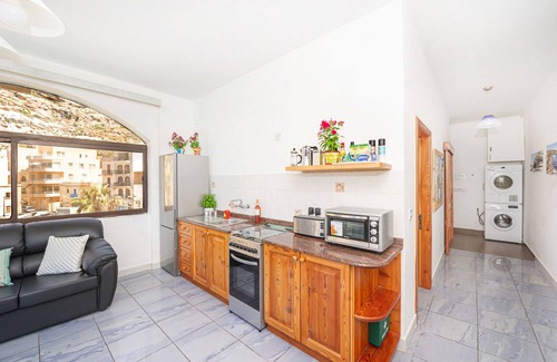 Munxar Appartement | Brilliant Beachfront Apartment with Super Sunset views in Xlendi Bay, Gozo Malta