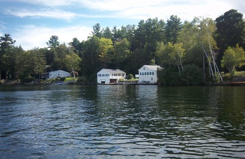 Laconia Maison | BRING YOUR BOATS WATERFRONT FAMILY COMPOUND SLEEPING 6-12