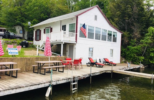 Laconia Maison | BRING YOUR BOATS WATERFRONT FAMILY COMPOUND SLEEPING 6-12