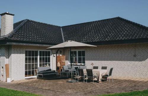 Lieme Maison | Bungalow mit Basketballplatz