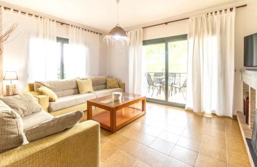 Quart Chalet De Ski | Ca La Iaia Casa con piscina y jardín