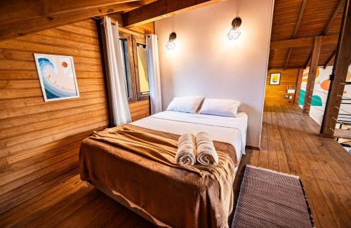 Vila Esperanca Maison | Cabana Perfeita a 800m da Praia - Lareira externa, Quintal Amplo, Pet Friendly, Ar condicionado, Netflix e Conforto completo