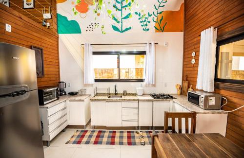 Vila Esperanca Maison | Cabana Perfeita a 800m da Praia - Lareira externa, Quintal Amplo, Pet Friendly, Ar condicionado, Netflix e Conforto completo