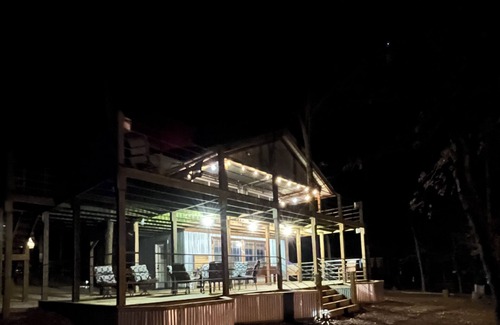 Vian Cabine | Cabin 1, AKA The Treehouse 1 bedroom and a loft. 2 bathrooms. Sleeps 5