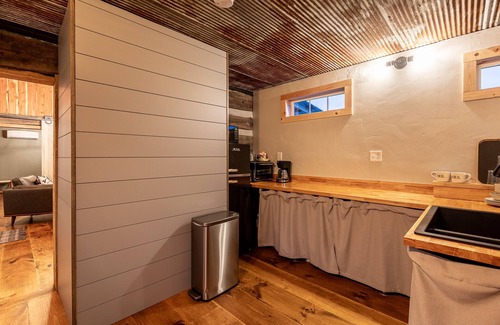 Sunnyland Cabine | Cabin Just Built! features two covered decks, living room, fireplace, kitchen