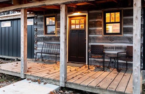 Sunnyland Cabine | Cabin Just Built! features two covered decks, living room, fireplace, kitchen