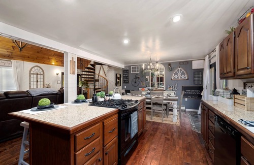 Warren Cabine | Cabin rental with Hot Tub, Fire Pit, mini fountain pond, hammocks, corn hole.