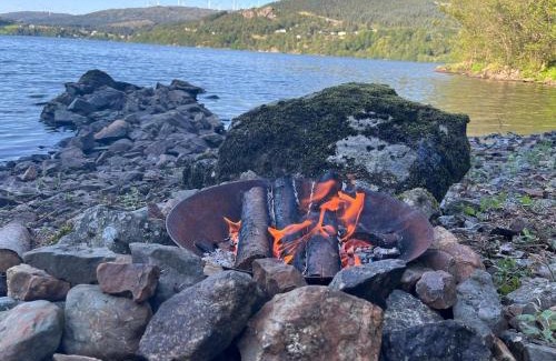 Fitjar Appartement | Cabin with a view to water