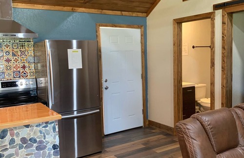 Camp Wood Cabine | Cabin with Deck . Close Nueces River