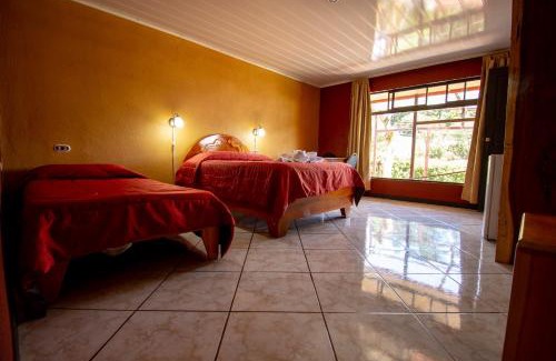 Santa Elena Lit Et Petit-Déjeuner | Cabinas Eddy B&B