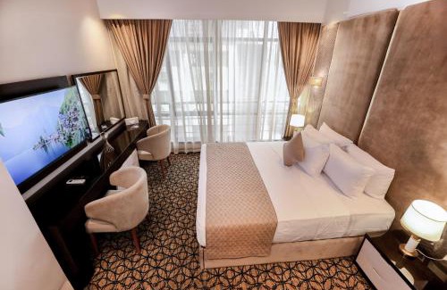 Al Duqqi Hôtel | Cairo Taj Hotels & Suites- Mohandessin