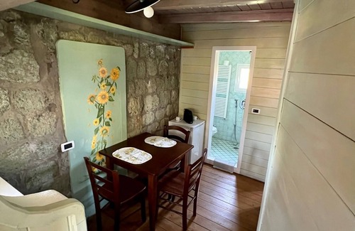 Panza Appartement | "Cambusa Cottage" with terrace, swimming pool and spa hot tub