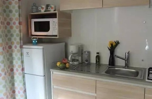 Boisseron Maison | Mobil-home Confort + EVASION 30m² (2 chambres) - terrasse couverte comprise + TV + Climatisation 5 personnes