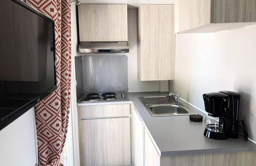 Le Grez Maison | Campsite Les Tournesols * - Mobilhome Evolution 45m2 (24m2+21m2 terrace) - 2 bedrooms 4 people