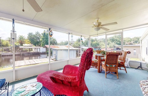 Astor Maison | Canal-Front Home with Private Covered Boat Dock & Waterfront Screened Porch