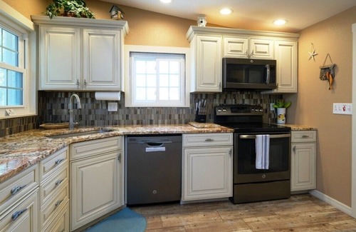 Bayshore Gardens Maison | CANAL FRONT W/DOCK, Water View, Dock your Boat, Free WIFI Dog* (See Note)...