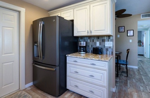Bayshore Gardens Maison | CANAL FRONT W/DOCK, Water View, Dock your Boat, Free WIFI Dog* (See Note)...