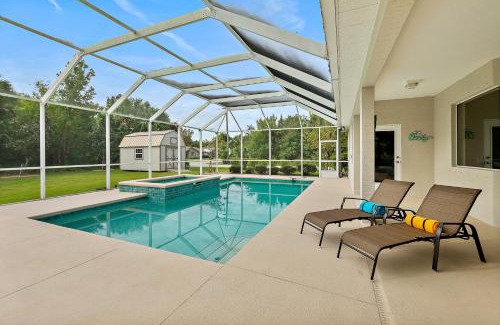 Palm Harbor Villa | Canal Waterfront Home with Private Pool