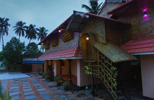Azheekal Lit Et Petit-Déjeuner | CANALVIEW PRIVATE COTTAGE Azhikkal Ayiram Thengu
