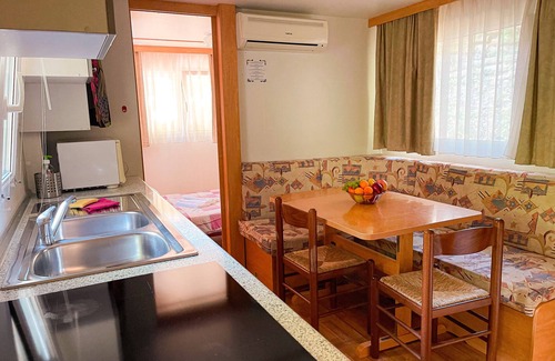 Palazzuolo sul Senio Location De VR | Caravane "Le Sorgenti - Mobile Home 46" avec vue sur les montagnes, jardin privé et climatisation.
