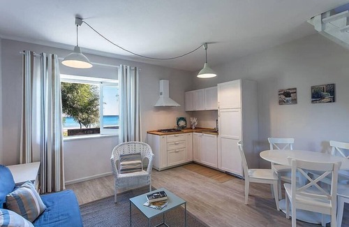 Santa Caterina Dello Ionio Marina Maison | Casa Iorana A: A welcoming two-story townhouse located right on the beach, with Free WI-FI.
