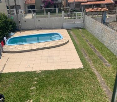 Tramandai Maison | Casa com 4 quartos e piscina pra aproveitar