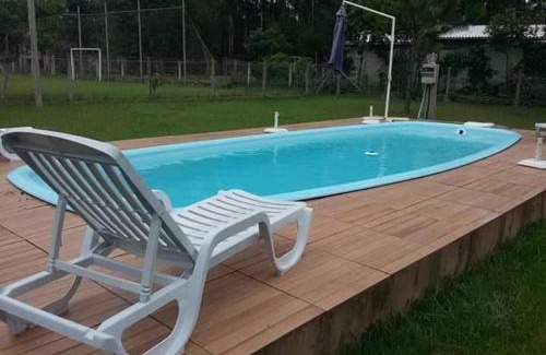 Torres Maison | Casa com piscina e salão de jogos para aluguel de temporada e finais de semana em Torres/RS.